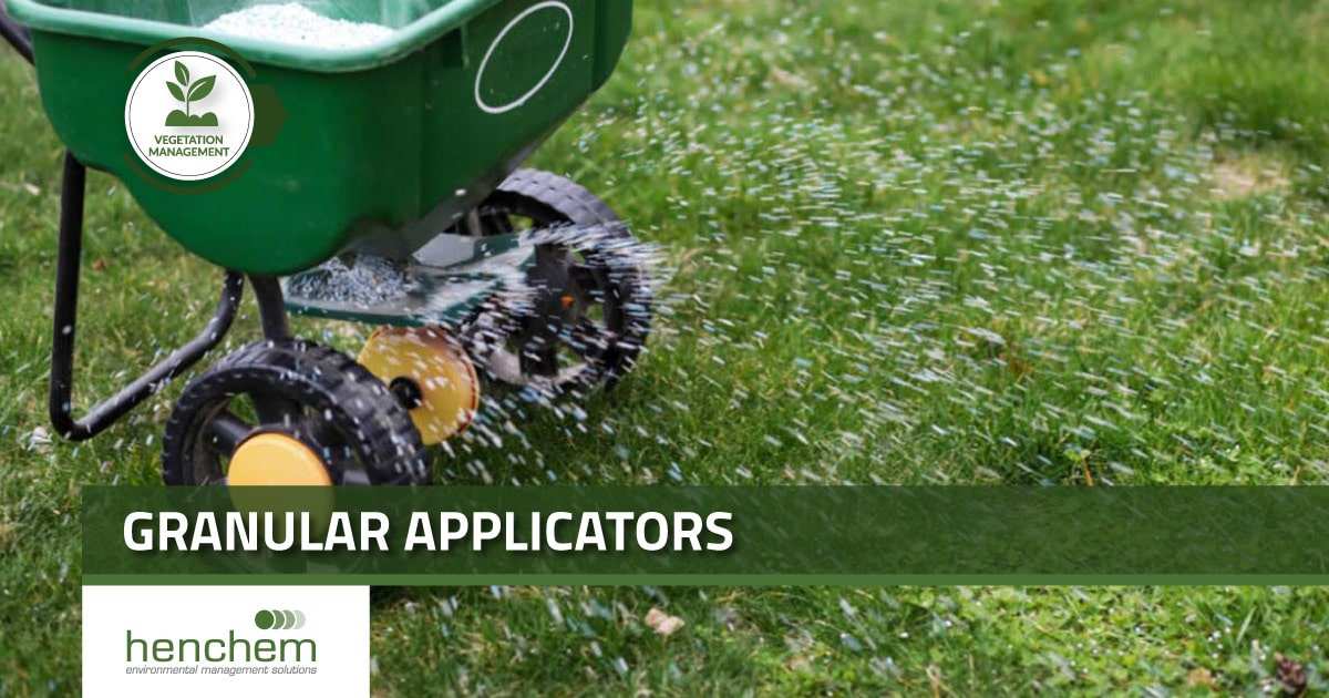 applying granular grub control product with spreader