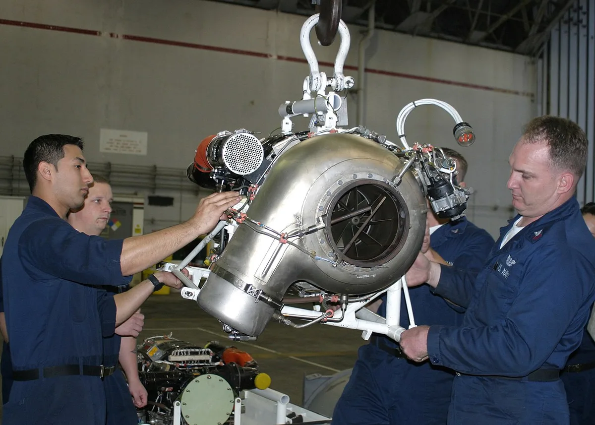 compressed air can cleaning small engine part