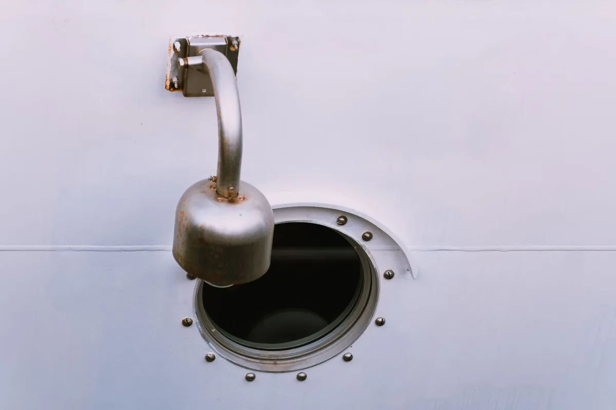 gas cap vent hole needle clearing