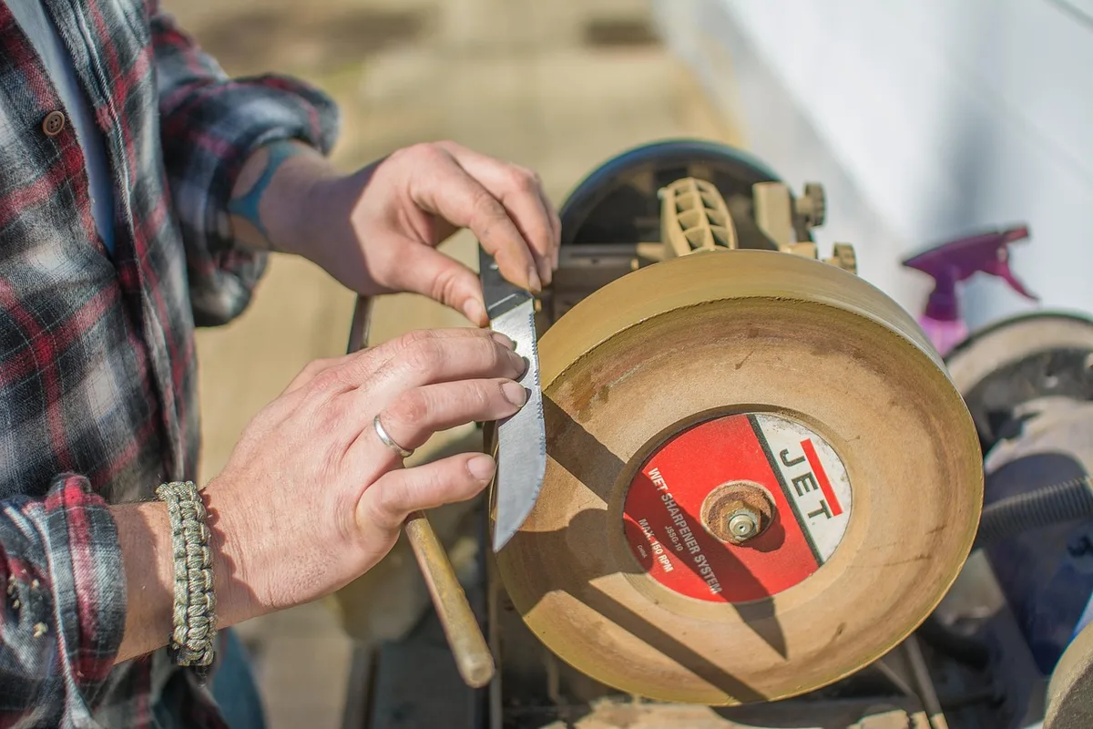 securing garden tiller blade in bench vise for sharpening