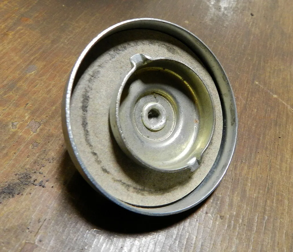 gas cap underside vent groove